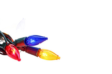 Closeup of colorful christmas lights isolated on transparent background