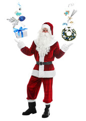 Santa Claus levitating gift box, festive decor and cookies on white background. Christmas magic