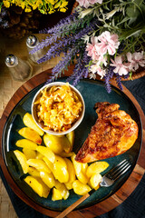 A delicious piece of roasted chicken.