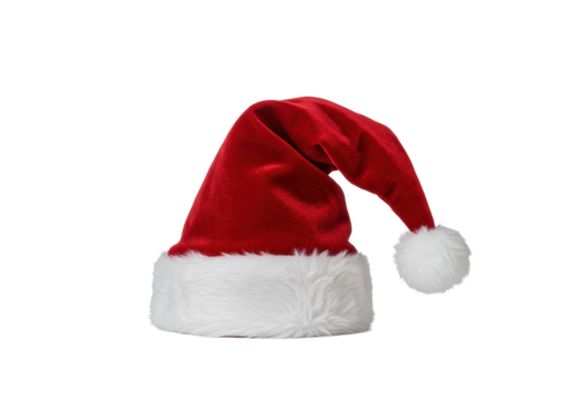 Detailed product shot of a plush, crimson red velvet christmas stocking cap with thick white faux-fur and pom-pom, isolated on a transparent background, high-end holiday concept.