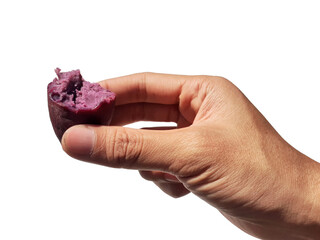 Holding a purple sweet potato in hand, isolated on PNG background.