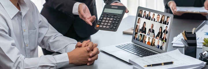 Business people on video conference for brisk virtual group meeting of corprate business office workers