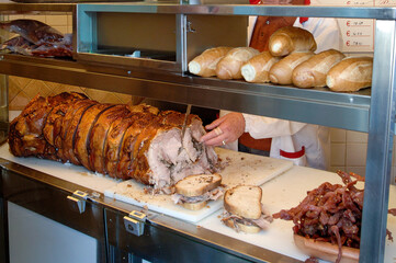 Porchetta d iAriccia  is typical food of Rome area and is a succulent, boneless Italian pork roast.