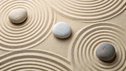 Stickers Stenen in het zand Zen sand garden with smooth stones and circular raked patterns   © Sajjad