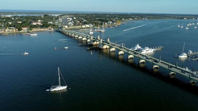 Aerial flyover of the Bridge of Lions crossing St Augustine harbor in Florida.