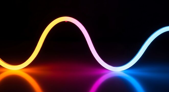 Colorful neon light strip with vibrant reflections on a dark surface