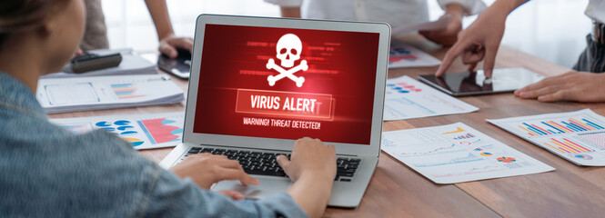 Virus warning alert on computer screen detected brisk cyber threat , hacker, computer virus and malware