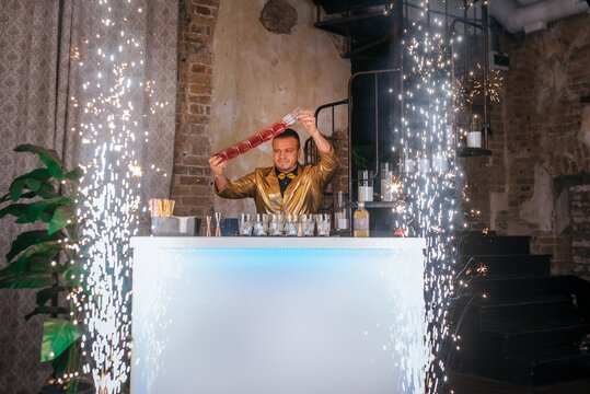 Enthusiastic bartending show with cocktail flair
