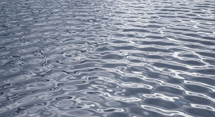 Obraz premium Rippling water surface showcases intricate patterns of light and shadow creating an abstract dynamic texture