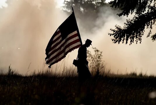 American Civil War Reenactment Footage Capturing a Soldier Holding the U.S. Flag Amidst Smoke