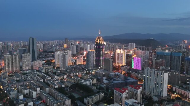 Xining Qinghai Aerial Nightfall - Illuminated Skyline with Golden Tower