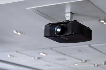 ceiling projector in conference room for presentation