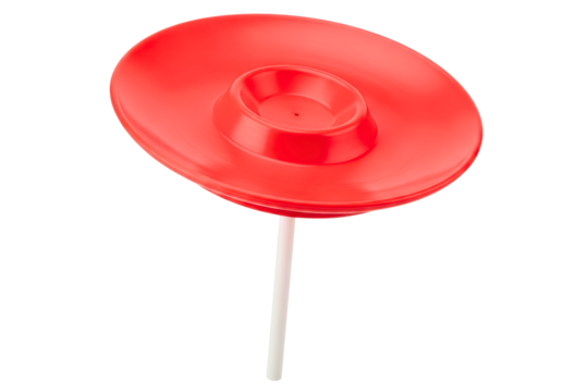 Red plastic juggling spinning plate balanced on white plastic stick isolated on a transparent background