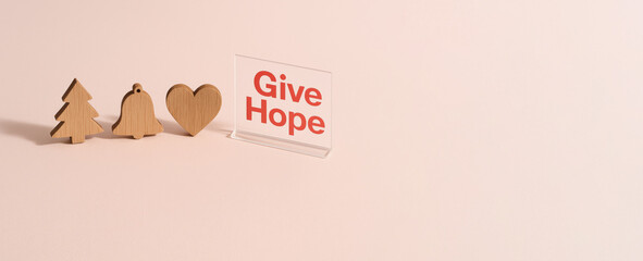 Christmas holiday charity theme with wooden icons and message, background