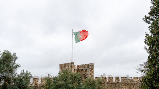 Portugal flag atop Sao Jorge Castle in Lisbon