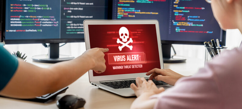 Virus warning alert on computer screen detected brisk cyber threat , hacker, computer virus and malware
