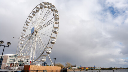Ferris wheel towering in Cardiff Bay, Wales landscape