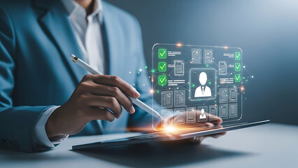 Business person using stylus on digital interface with checklist and profile icon above laptop keyboard