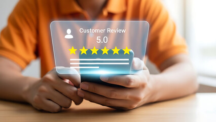 Person holding smartphone displaying a fivestar customer review rating with holographic interface overlay in a closeup shot