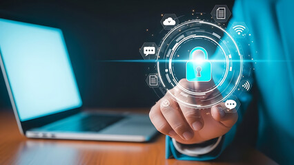 Businessman touching a digital padlock icon representing cybersecurity and data protection in front of a laptop