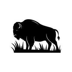 Obraz premium Black silhouette of a bison standing in grass, facing left, against a white background.