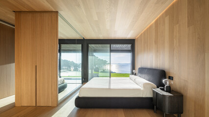 Minimalist bedroom in modern Cantabria architecture