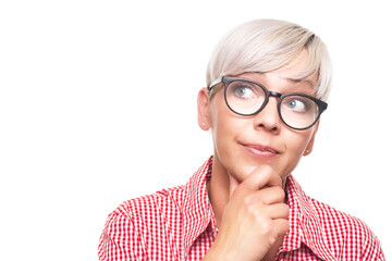 Adult woman looking up and thinking. Portrait of decidedly inspired woman with smile face expression, copy space for text, isolated on white background.