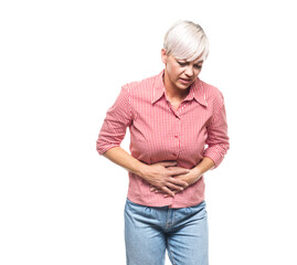 Adult woman suffering from stomachache - stomach ache, isolated on white background. Ill middle aged woman with chronic gastritis.