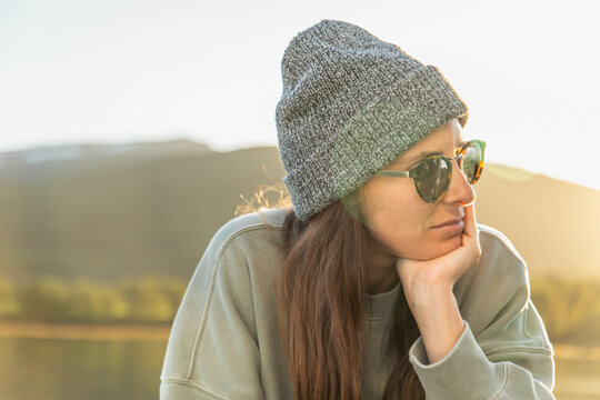 Serene woman enjoying life on a boat in Norway