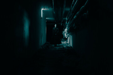 Horror scene of spooky female ghost in black dress