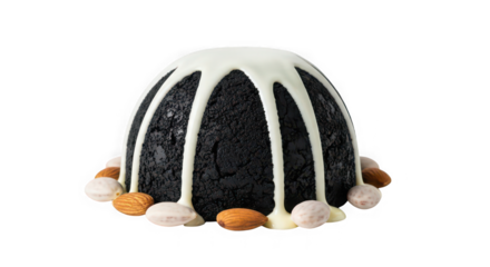 Rich dark chocolate cake drizzled with white icing and candied nuts