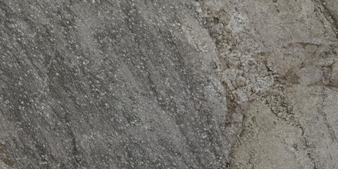 The rough surface of a stone slab with a concrete hue. Design for porcelain tiles