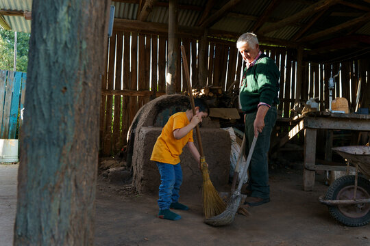 Chores in a rustic Chilean home strengthening family bonds