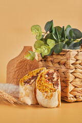 Traditional Mexican burrito with beef and vegetables. Mexican cuisine dish