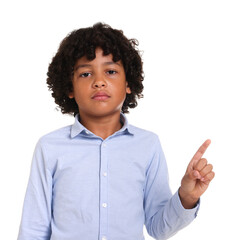 Portrait of little boy pointing on white background