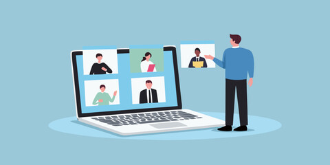 Man participating in a video conference call with colleagues on a laptop