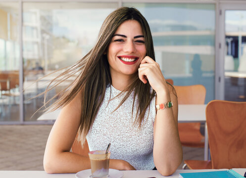 Woman enjoying break during telecommuting workday