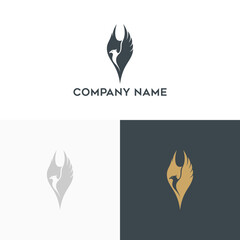 Elegant phoenix emblem with powerful rising wings, a modern and minimalist symbol of rebirth for corporate brand identity