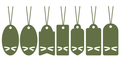 Seven green tags with different shapes and bow cutouts hanging from strings