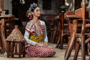 Indonesian woman in traditional Javanese attire