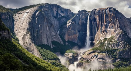 Majestic waterfall cascading down granite cliffs amidst misty mountains nature landscape beauty travel