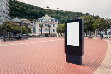 Digital billboard in Luarca's picturesque summer plaza