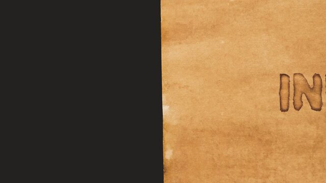 Independence. The word is handwritten on aged brown paper. Movement from right to left. 4k video. Layout, concept.