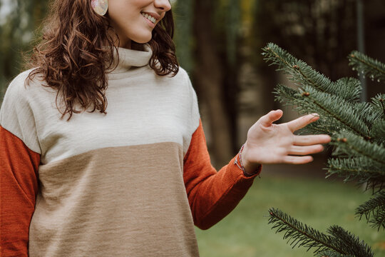 Woman appreciating nature's sustainable beauty
