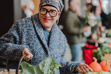 Woman at organic market promoting sustainable living