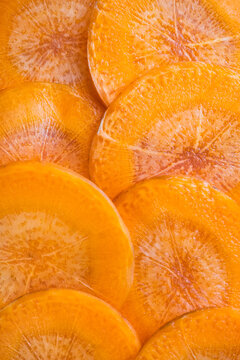 Close-up of sliced orange carrot showing texture details