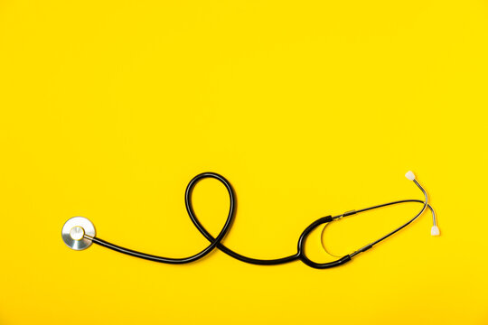 Stethoscope on the table. Medical instrument. Medical concept. Healthcare. Health Day.Doctor equipment. Cardiology. Heart disease.Lung diagnostics.Diagnosis of respiratory inflammation.Space for text - Powered by Adobe