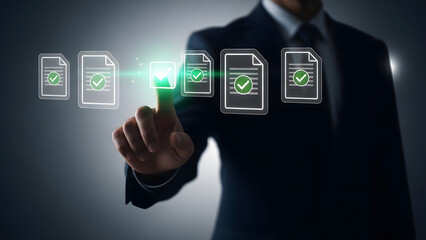 Hand selecting approved document with green checkmark in futuristic interface