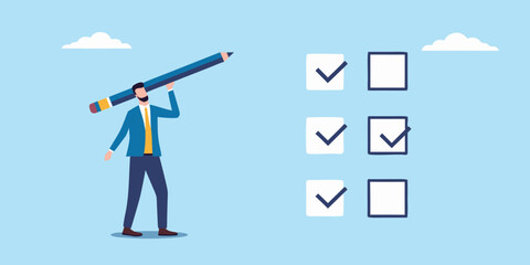Businessman holding a large pencil checking off items on a list