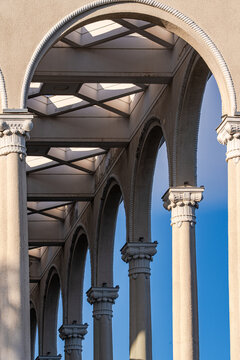 Sunlight Illuminating Classical Stone Arches